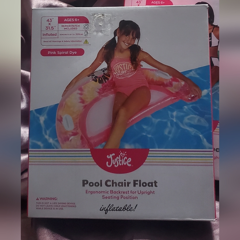 Justice Pool Chair Float in a pink spiral dye design size of this  is 43"×31.5"